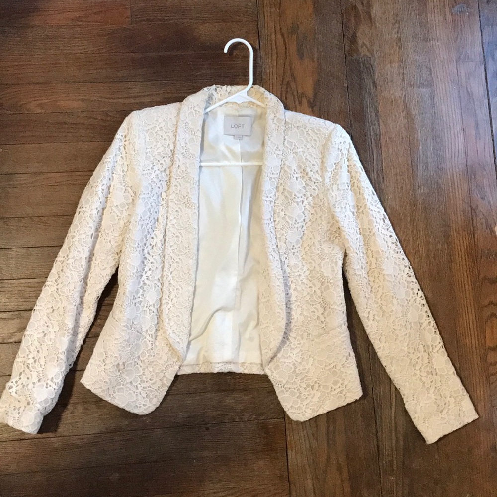 Size 2 Ann Taylor Loft crocheted blazer in cream.